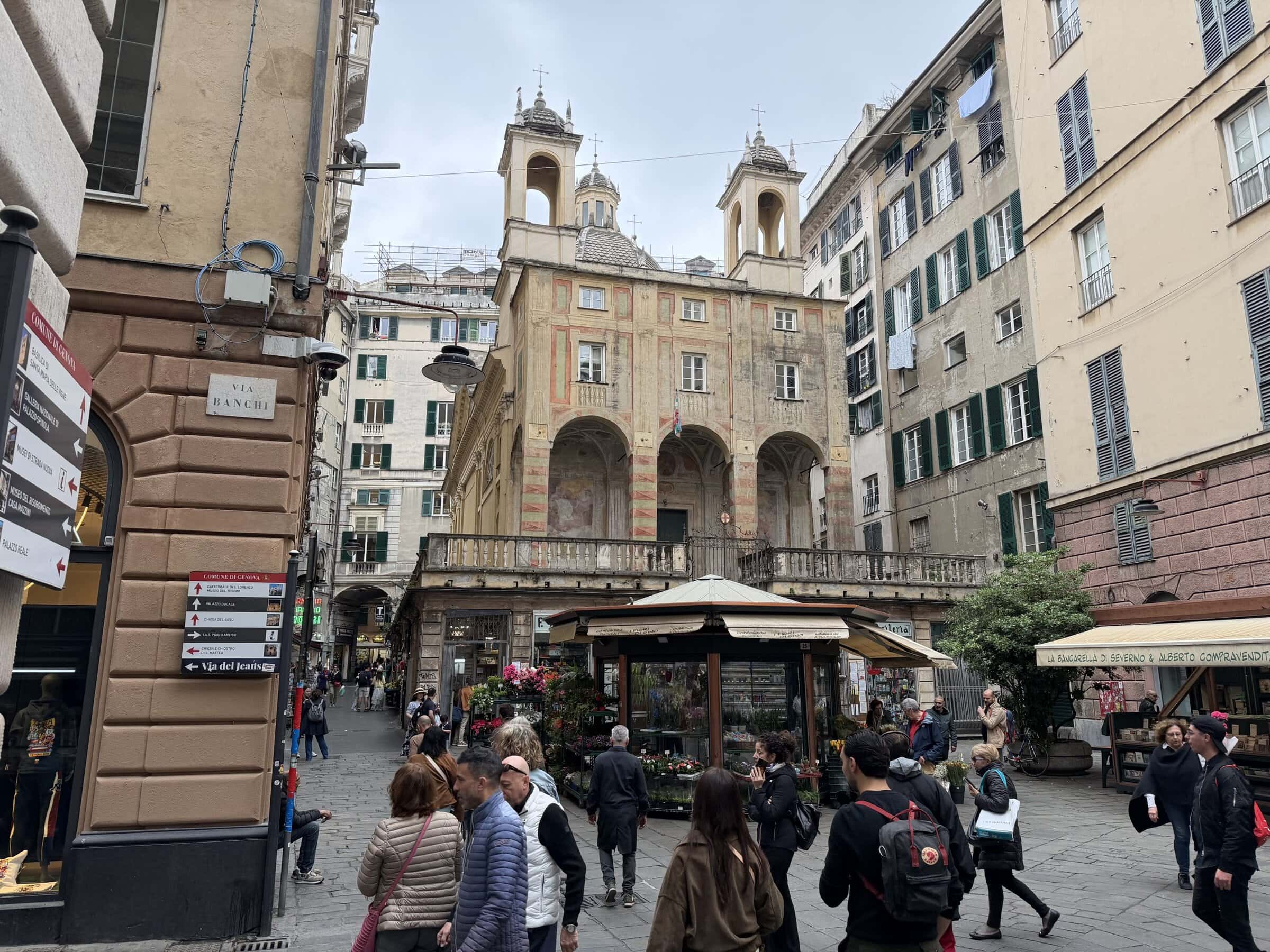 A church with stores on the first floor.