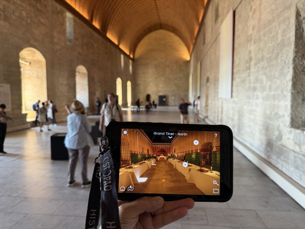 Inside Avignon's Palace of the Popes with their virtual reality device.