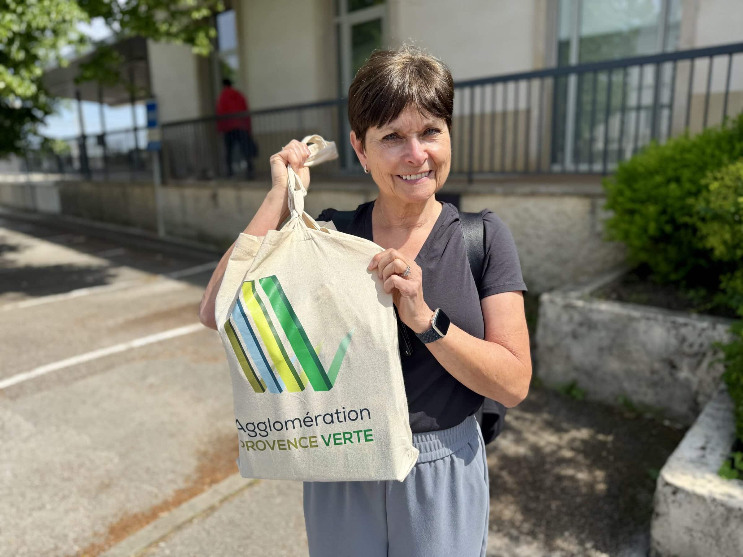 Karen showing off the bag of meds we left in Lyon