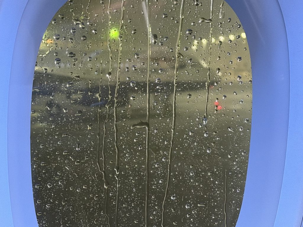 Sitting on a plane looking out the window at so much rain