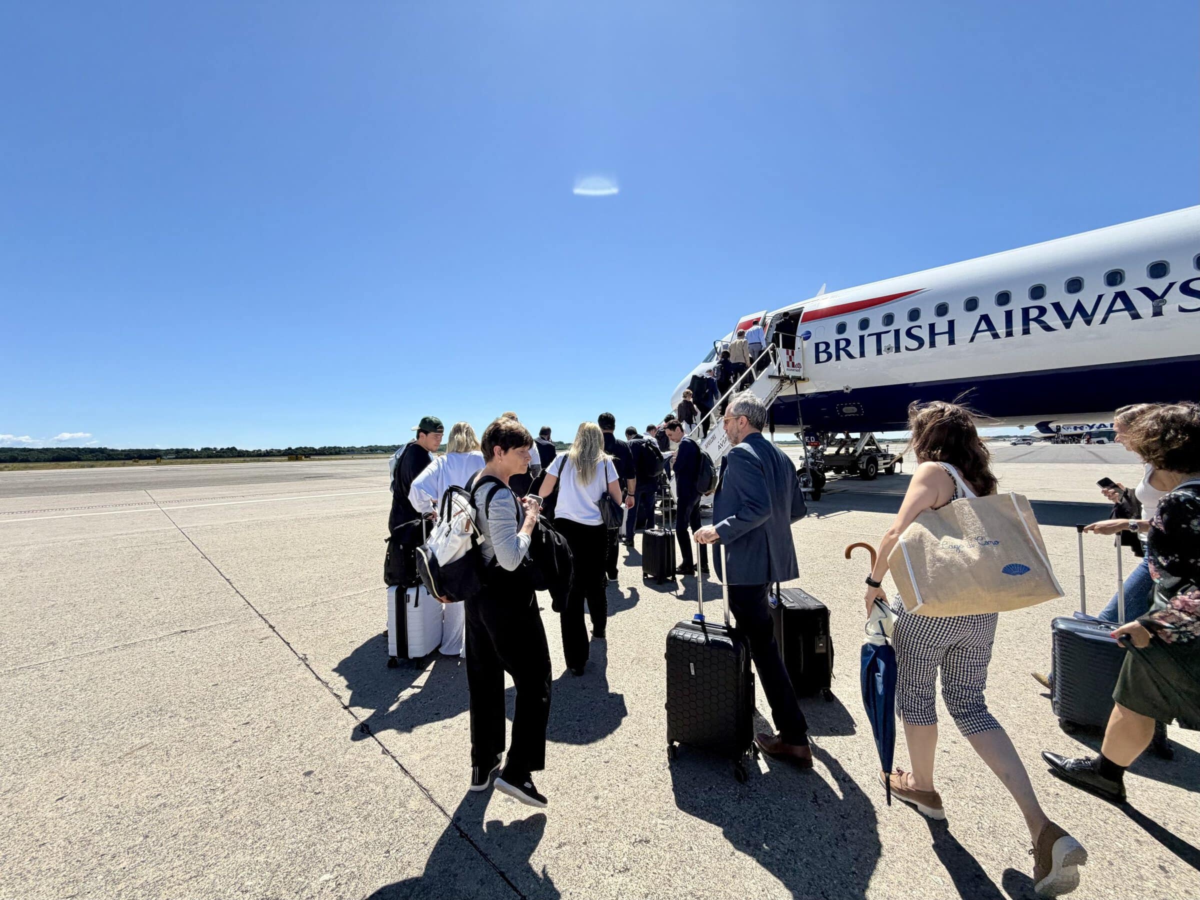 Getting on a British Airways plane.