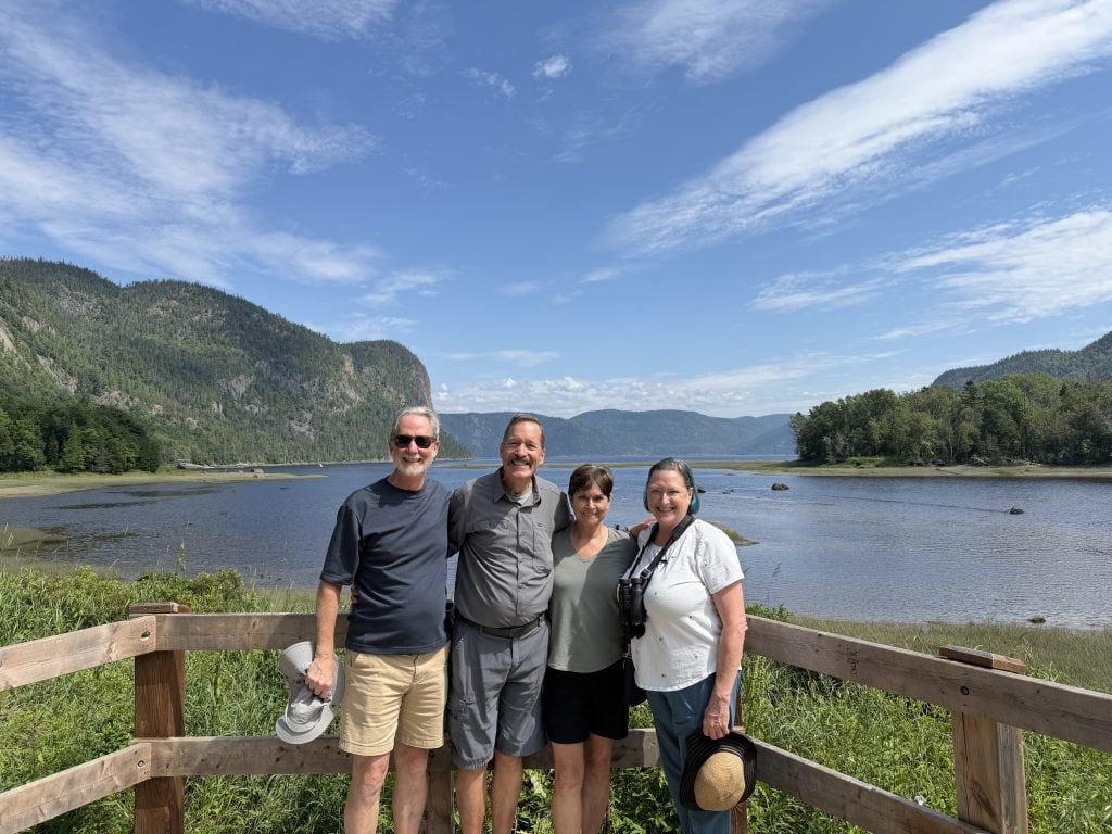 Pausing by the Saguenay Fjord on our hike
